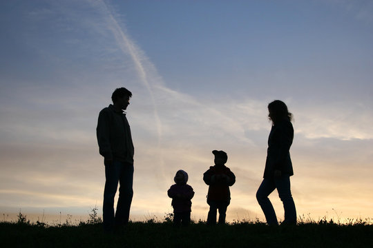 silhouette family of four