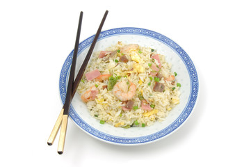plate of fried rice and chopsticks