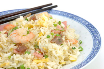 plate of fried rice and chopsticks