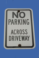 no parking across driveway sign