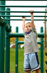 Fototapeta premium boy on monkey bars