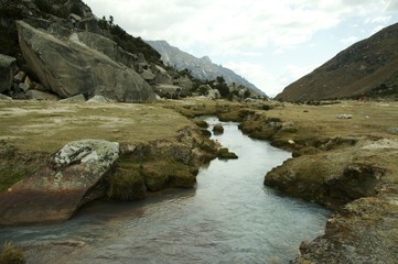 river on the grassland in mountain