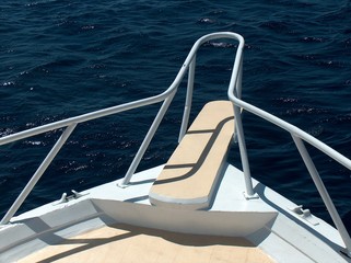 a bow of a boat against water surface