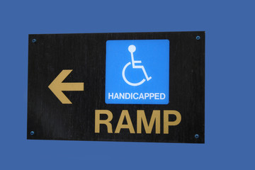 wheelchair ramp direction sign
