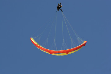 paraglider performing perfect looping manoeuvre