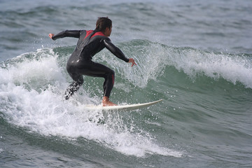 surfer with spiderman suit