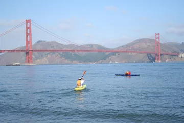 Fotobehang kayaking by the golden gate bridge © Stephen Finn