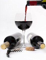 pouring a glass of red wine