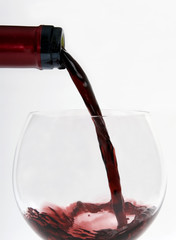 pouring red wine