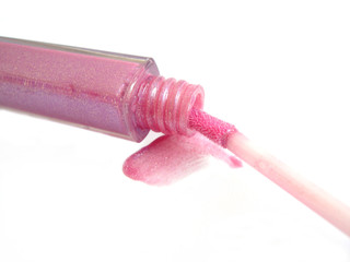 opened pink gloss for lips on white background