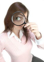 young woman with magnifying glass