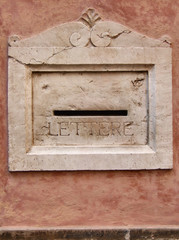 old decorative stone mailbox