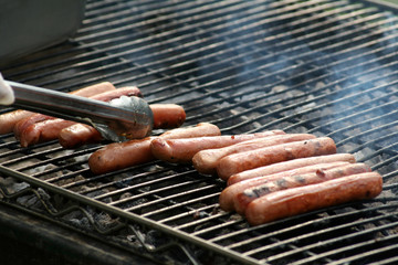 hotdogs on the grill