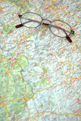 map and glasses