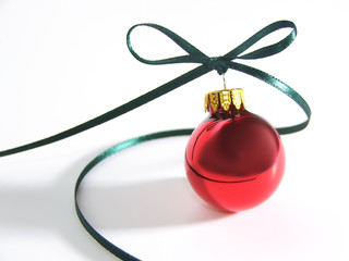 red ornament with green ribbon