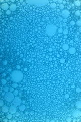 Obraz premium blue backlit bubbles background