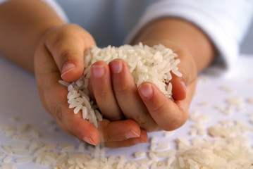 hands with rice