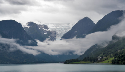 mountains and glacier above the lake