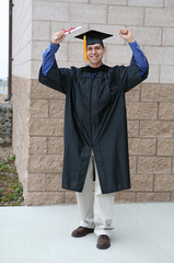 man celebrating graduation