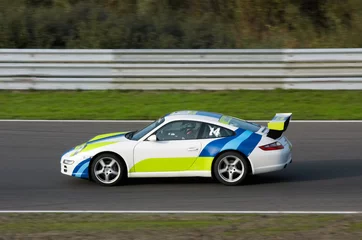 Poster racing on circuit © Eric Gevaert