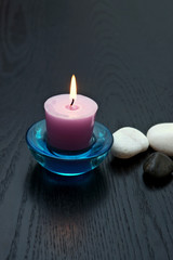 Fototapeta na wymiar candle with stones