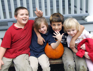 four kids playing together