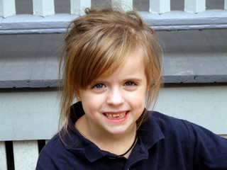 close up of young girl smiling