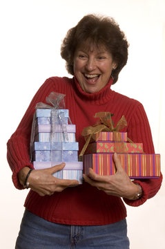 happy woman with gifts stack