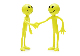 figures of smilies shaking hands