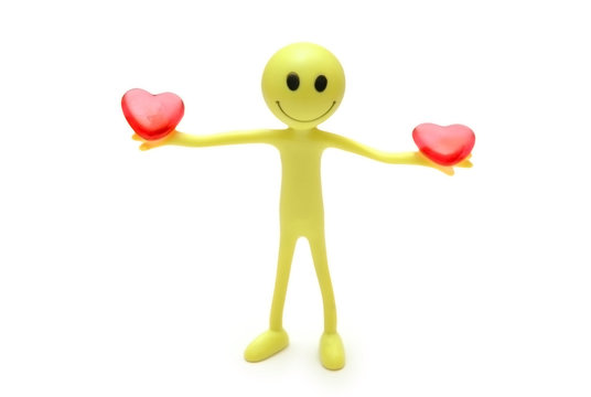 smiley holding two red hearts in hands