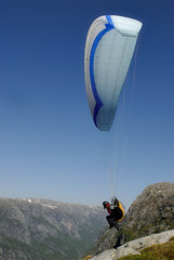 paragliding over mountains