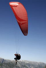 paragliding over mountains