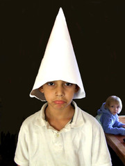 boy with dunce cap