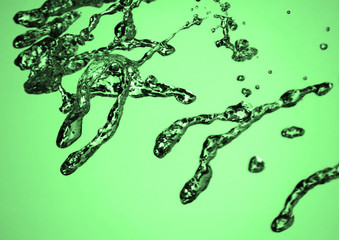 abstract water drops over green background