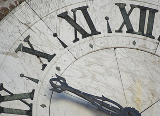 face of ancient clock