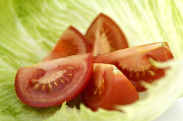 tomatoes on lettuce leaf