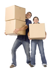 Fototapeta na wymiar house renovation - couple carrying boxes
