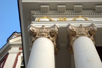golden and white decorated columns