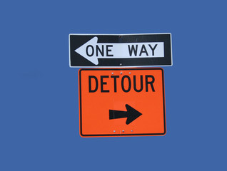 conflicting direction signs