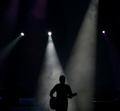 silhouette of a guitar player