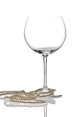 pearls wrapped around a wine glass