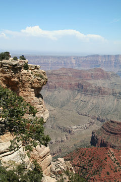 grand canyon overlook with people on ledge