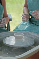 potters wheel and finished pot