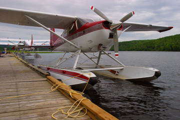 docked float plane on a remote lake in Northern Canada
