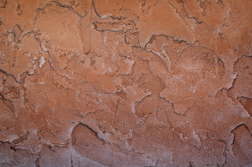 stucco with texture in brown tones