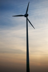 wind generator on sunset
