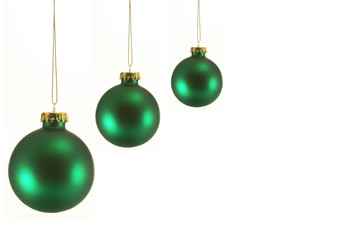three green christmas ornaments