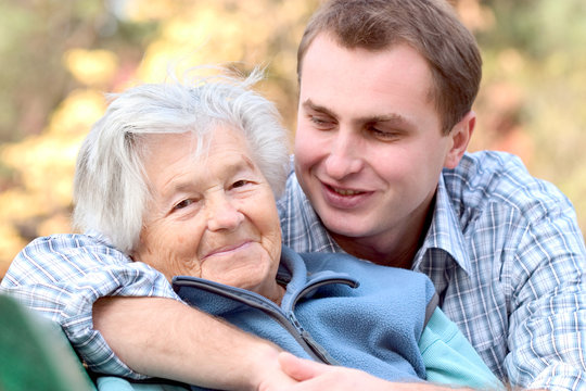 elderly person with grandson