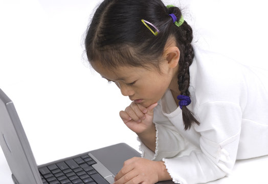 young girl on a laptop