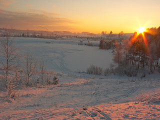snowy sunset with urban background